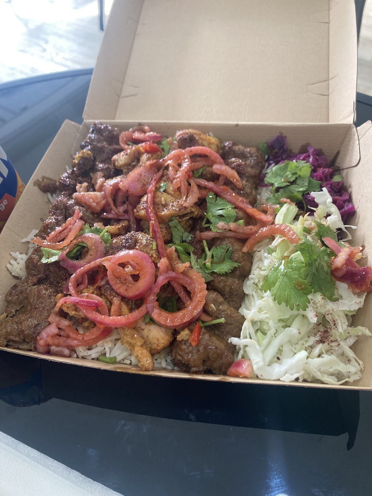 Mixed kebab takeaway box with fresh salads
